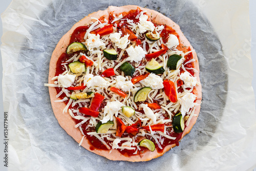 Photography vegetarian pizza with zucchini capsicum and red lentil base on rustic homemade c