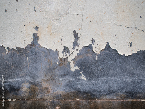 Cement wall surface with peeling paint