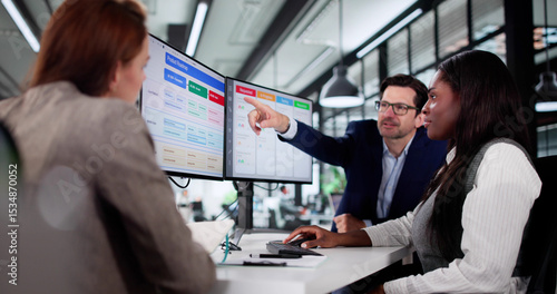 Photos Multiracial Manager Uses Kanban Software On Laptop