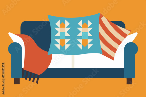 stylish throw pillows and patterned blanket on cou.svg