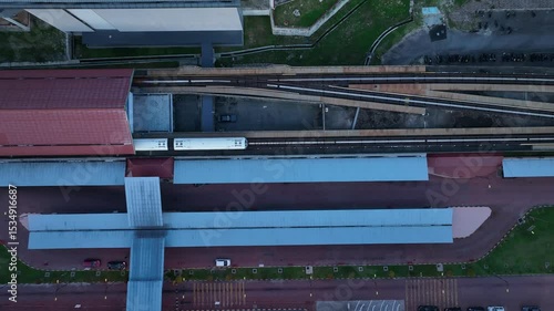 Stunning aerial view of Kuala Lumpur’s transportation hub showcasing train tracks and modern architecture