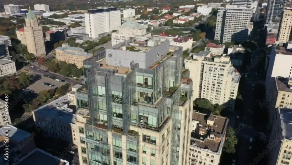 Modern high-rise apartment building with rooftop garden surrounded by urban skyline. Architecture concept
Modern high-rise apartment building with rooftop garden surrounded by urban skyline. Architecture concept