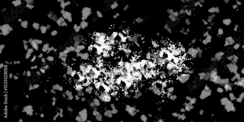 Snowflakes on dark background. white icy snowflakes isolated on black background, natural background. white crystalline powder on a black background. sugar dust. texture, pattern and clipping.