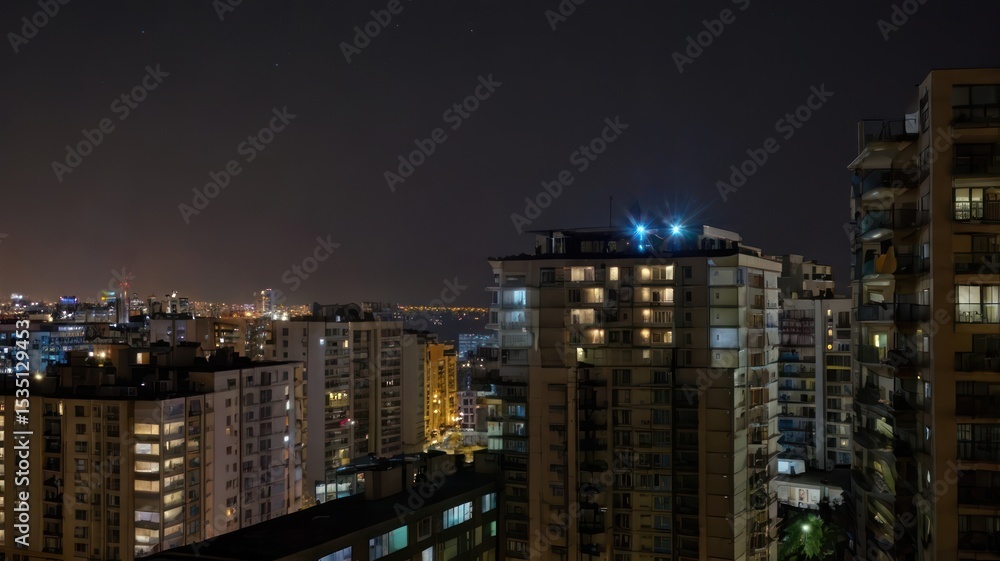 Fototapeta premium Cityscape at night, lights of high-rise buildings