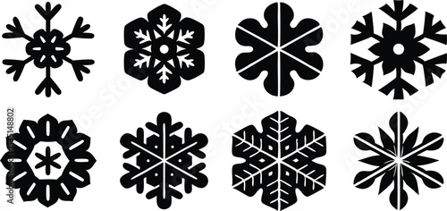 Snowflake icon set – vector silhouettes of winter holiday flakes in geometric decorative patterns