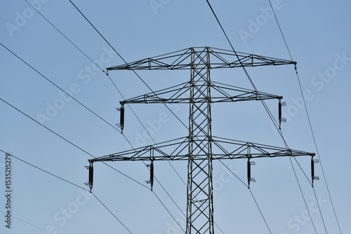 Hight voltage pole and blue sky, electric cebles in Wroclaw, Poland.