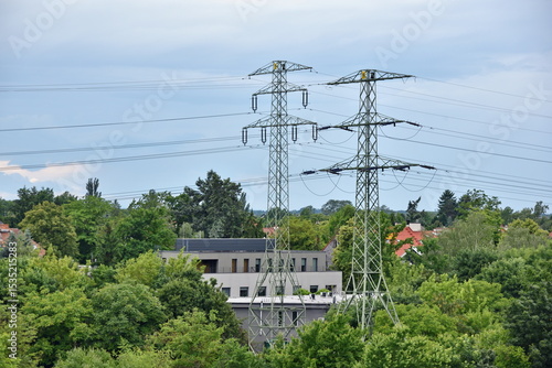 Hight voltage pole and blue sky, electric cebles in Wroclaw, Poland.