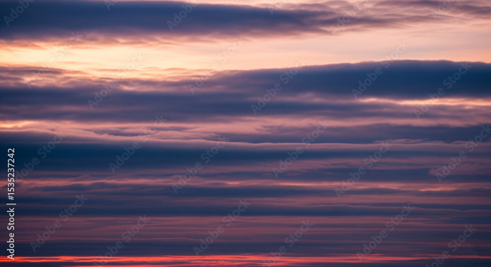 Obraz premium Natural blue sky with soft white clouds in daylight, featuring authentic cloud formations and clean atmosphere, ideal for backgrounds, weather visuals, or serene outdoor scenes