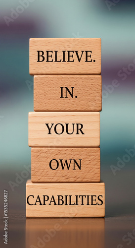 Wallpaper Mural Stack of wooden blocks with motivational message: Believe in your own capabilities.  Symbolizes self-belief and empowerment Torontodigital.ca