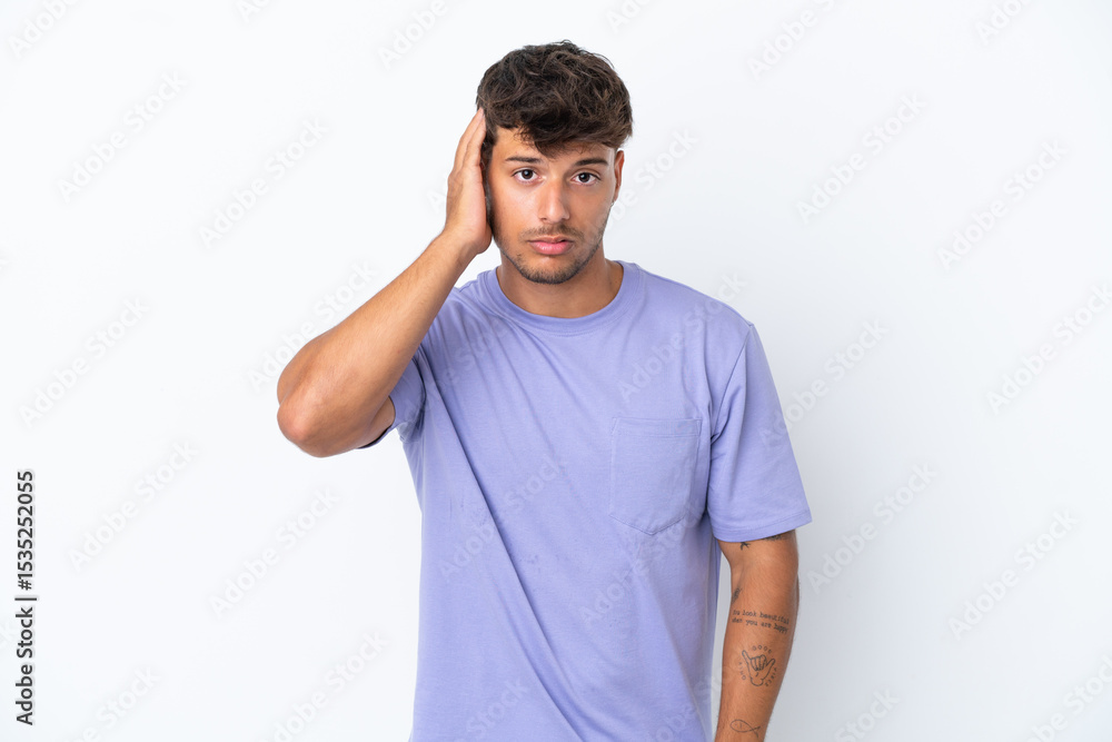 Young caucasian handsome man isolated on white background with an expression of frustration and not understanding Young caucasian handsome man isolated on white background with an expression of frustration and not understanding