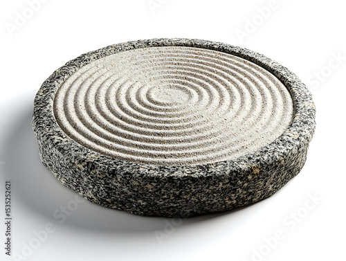 Zen garden stone with swirling sand design.