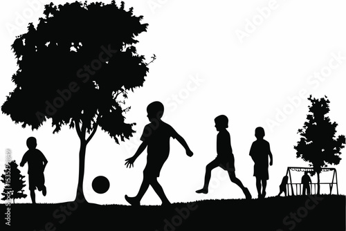 Silhouette of children playing soccer in a park with trees and a swing set.