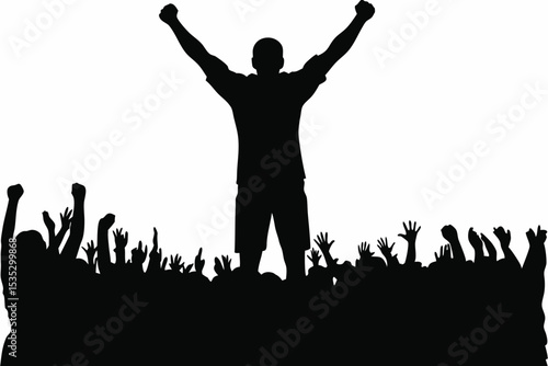 Silhouette of a triumphant man with raised arms standing before a cheering crowd.