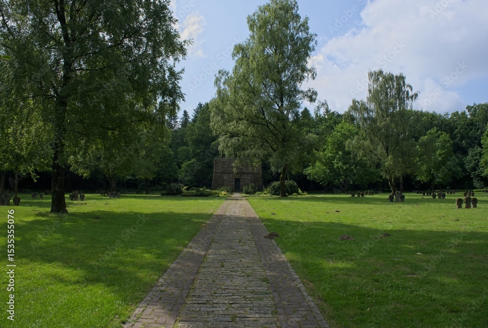 Kleve, Germany - Jun 2, 2025: The German War Cemetery Kleve-Donsbrugger Heide contains 874 german war graves from WW2. Sunny spring day. Selective focus Kleve, Germany - Jun 2, 2025: The German War Cemetery Kleve-Donsbrugger Heide contains 874 german war graves from WW2. Sunny spring day. Selective focus