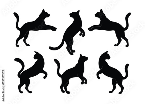 Black cat silhouettes in various poses against a white background for decorative and design usage