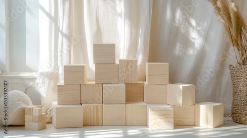 Stack of Natural Wooden Blocks near Sheer Curtains in Sunny Room