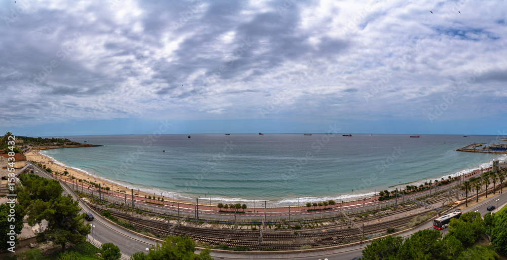 Naklejka premium Panorama view of Platja del Miracle beach and Balearic sea on the Dorada coast from Mediterranean Balcony in summer, Tarragona, Catalonia, Spain