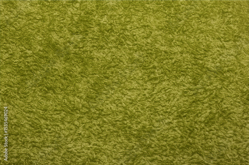 Close-up of a green textured fabric, perfect for presentations and backgrounds