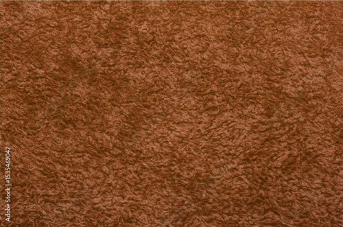 Close-up of a rough, brown fabric texture