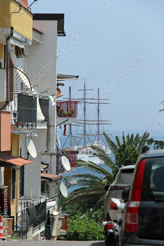 modern sailship through street