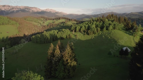 Traditional Transylvanian mountain village in summer, with vibrant colors and rural landscape