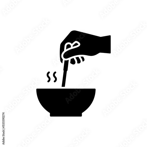 Hand stirring soup in bowl with spoon close up for cooking and dining