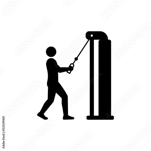 Fit man pulling cable machine row for back strength gym workout