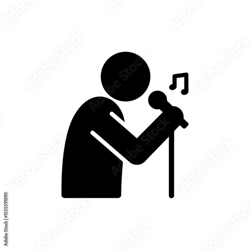 Person singing passionately into microphone on stage
