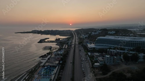 Wallpaper Mural Stunning aerial sunset to night transition over Turkler in Alanya, Turkey. Alanya coastline,resorts,marina,hotels and city lights along the Mediterranean Sea drone view. Mediterranean Sea coastline. Torontodigital.ca