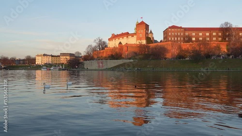 Wallpaper Mural Krakow, Poland: Sunset over the Wawel Royal Castle, fort and cathedral by the Vistula river in the on a sunny winter day in Poland.  Torontodigital.ca