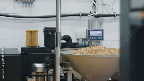 Fotografie Coffee beans weighing and processing in modern