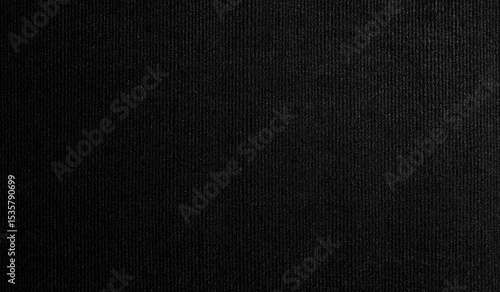 A high-resolution image of black felt fabric with a flat surface, showcasing its smooth and soft texture. The fabric is seamlessly captured, offering a seamless pattern perfect for design projects 