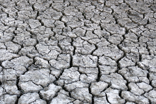 Deep splitting and cracking of the soil as a result of the decrease in near-water levels,