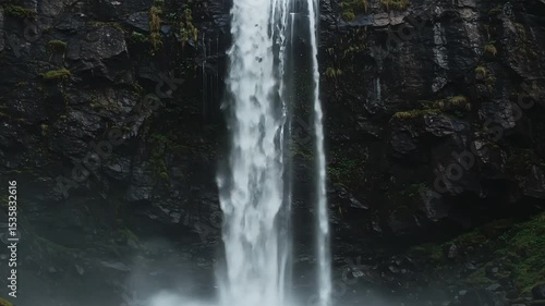 Wallpaper Mural Majestic waterfall flowing over rocky cliff in natural landscape   Torontodigital.ca