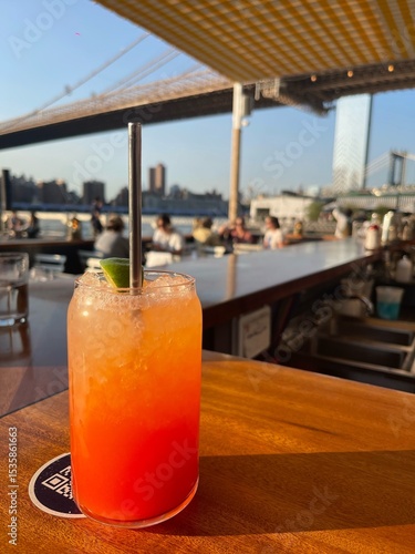 cocktail on a bar counter by the water