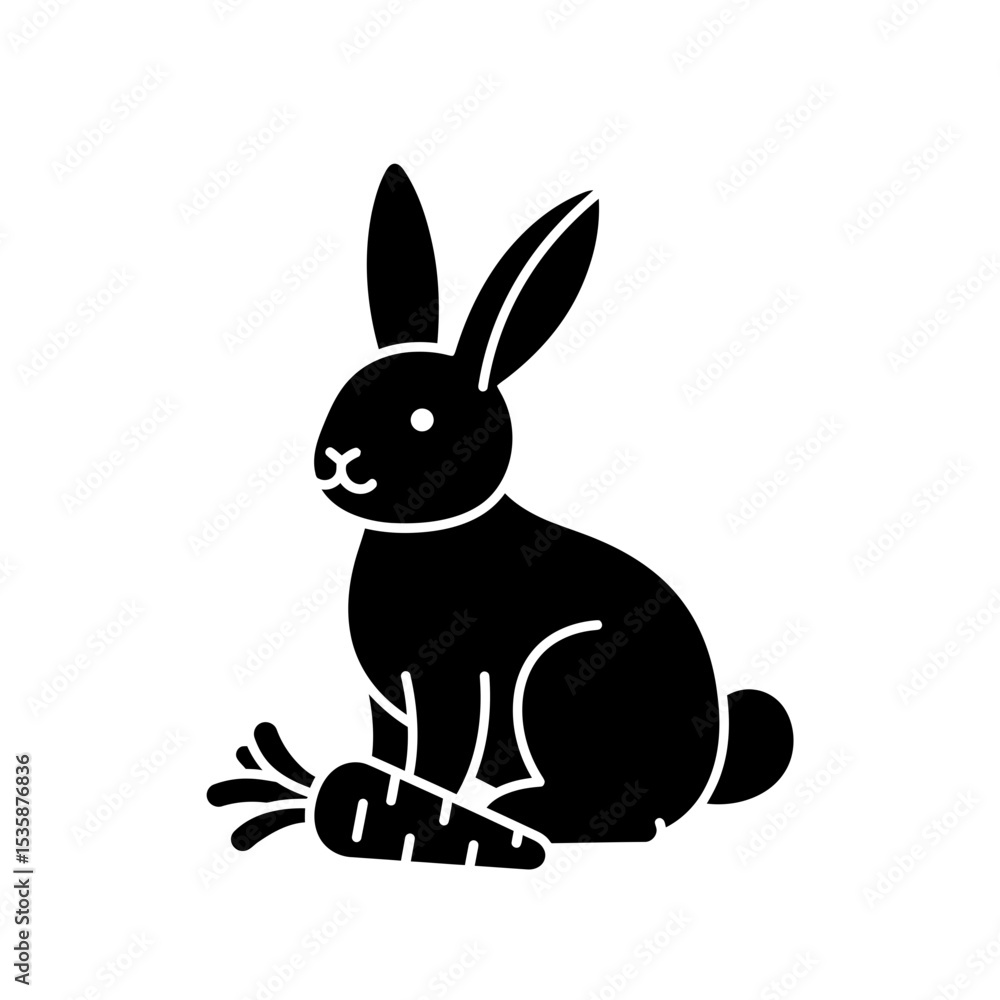 Obraz premium Black silhouette of a rabbit sitting next to a carrot 