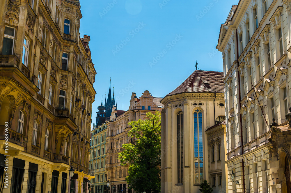 Fototapeta premium A view of ornate buildings in a street in the Jewish quarter of Prague in springtime