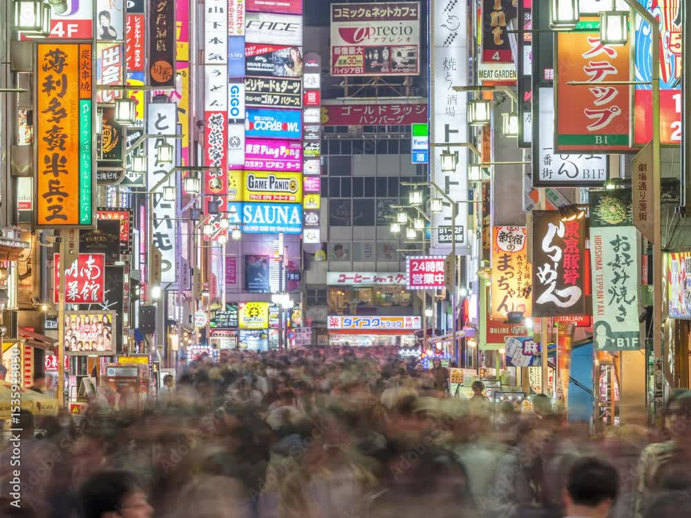 Night time-lapse in Shinjuku, Tokyo with people traffic Night time-lapse in Shinjuku, Tokyo with people traffic