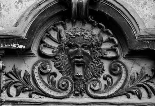 Fotografie Scary old gothic ornament on the old villa.
