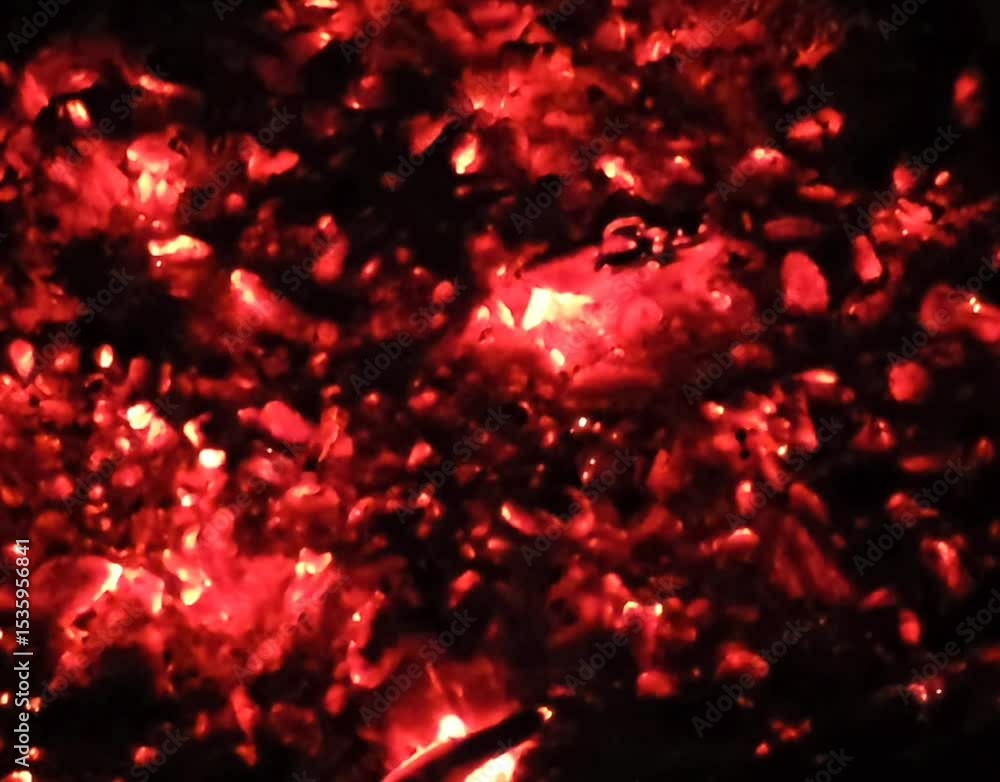 Close-up of a burning log in the fireplace. The log is enveloped in bright orange flames, creating a cozy and warm atmosphere. Perfect for projects related to winter, holidays, and relaxation. Close-up of a burning log in the fireplace. The log is enveloped in bright orange flames, creating a cozy and warm atmosphere. Perfect for projects related to winter, holidays, and relaxation.