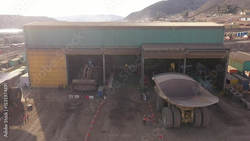 Maintenance of Mining Trucks in Truck Shop – Mechanics Working on Extraction Vehicles in Northern Chile