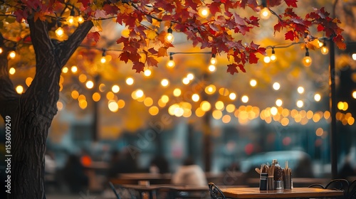 Wallpaper Mural Outdoor cafe scene at twilight, with warm lighting and autumn leaves. Torontodigital.ca