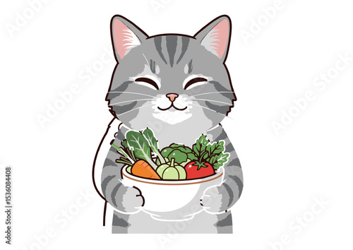 Cute young domestic kitten looking at a white flower