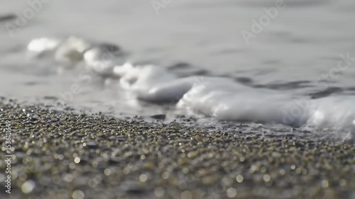 Wallpaper Mural Serene Coastal Scene Ocean Waves Gently Kissing the Sandy Shore, a Tranquil Beachscape of Soft Foam and Sparkling Grains Torontodigital.ca