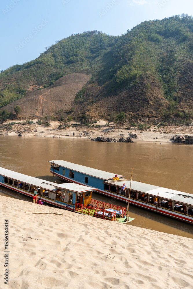 Naklejka premium boat on the river