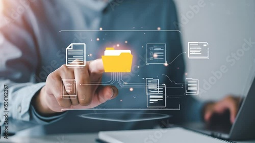 A person interacts with a digital interface displaying file folders and documents