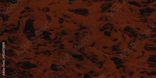 The surface of a material showing rough texture with porous formations in a reddish brown color creating a natural style image