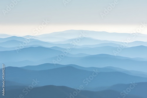 Misty blue mountain range layers beauty