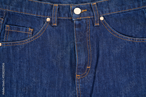 Close up of classic blue jeans textile. Detail of denim pants.