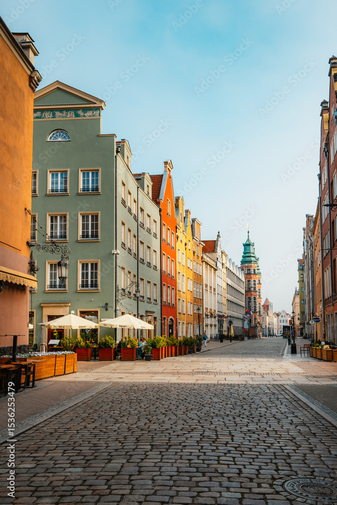 Obraz premium Gdansk with Motlawa river in Poland. Old town colourful house with saint Marys church i main square.